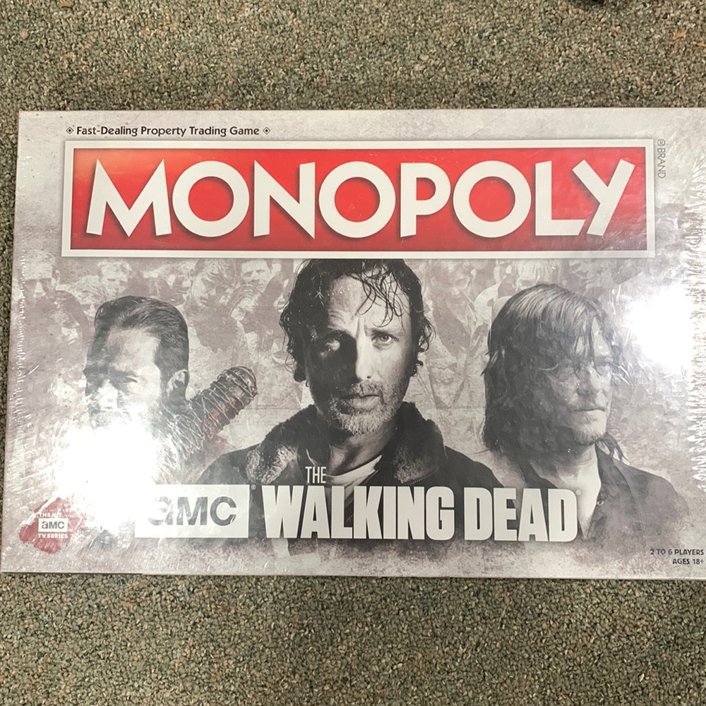 Walking Dead Monopoly & The Walling Dead Survival
Edition plus a set of glasses